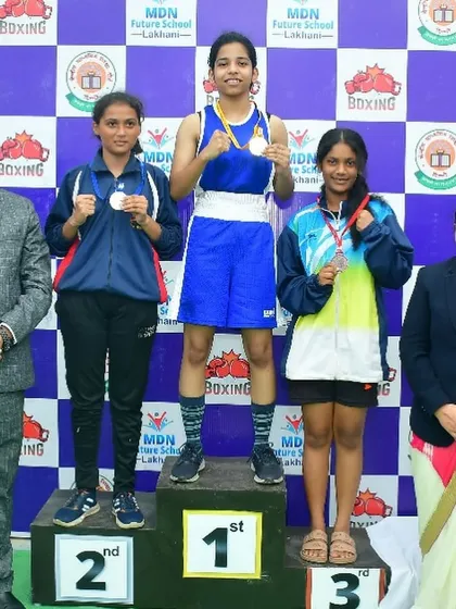 Jignasha Barge celebrating her gold medal win at the CBSE School Games.