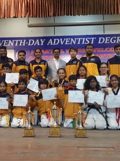The entire contingent with their certificates, medals, and trophies from the ICSE Nationals. A testament to the depth of talent at our academy.