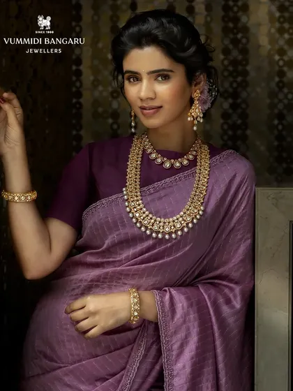 A classic and elegant look for a jewelry campaign. I styled this beautiful pearl and polki necklace set with a simple purple silk saree, allowing the intricate jewelry to be the star of the show.