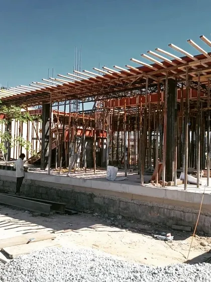 A look at the construction phase of an upcoming clubhouse in Bangalore. This image shows the concrete and formwork structure, the skeleton that will support the final architectural vision. We believe in overseeing projects from concept to completion.