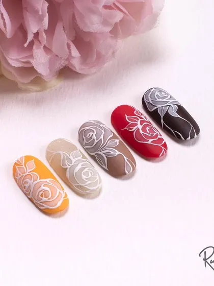 A collection of rose designs in various colors, a fundamental skill for any nail artist.