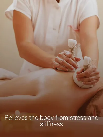 Here, a therapist applies a warm herbal potli to the client's back. This technique is particularly effective for relieving the body from accumulated stress and stiffness in the muscles.