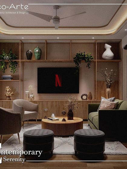 Unwind in a haven of contemporary serenity. This living room is a perfect example of modern charm, where every detail, from the curated shelving to the comfortable seating, speaks of relaxation and style.