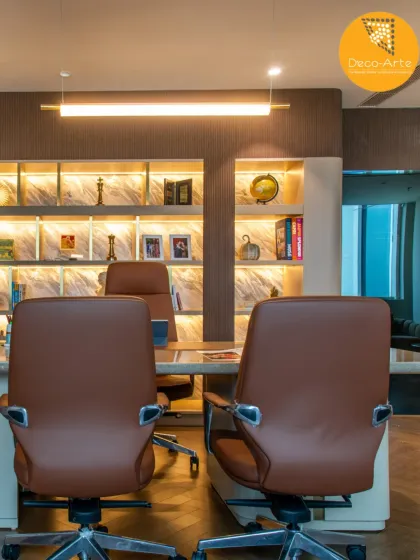 A closer look at the executive office at Brandman. Thoughtfully lit shelving and warm tones create a backdrop of functional finesse, perfect for a focused and inspiring workday.