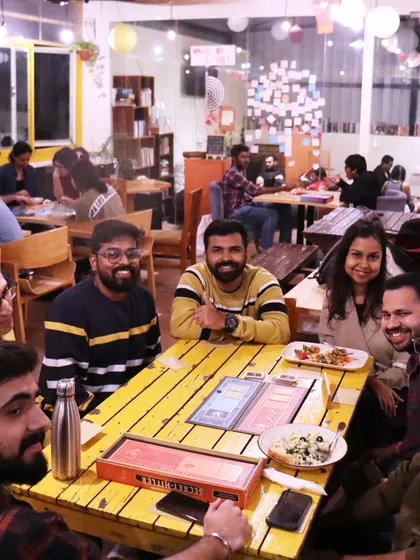 Thumbs up for a successful game night. It's wonderful to see everyone having such a great time.