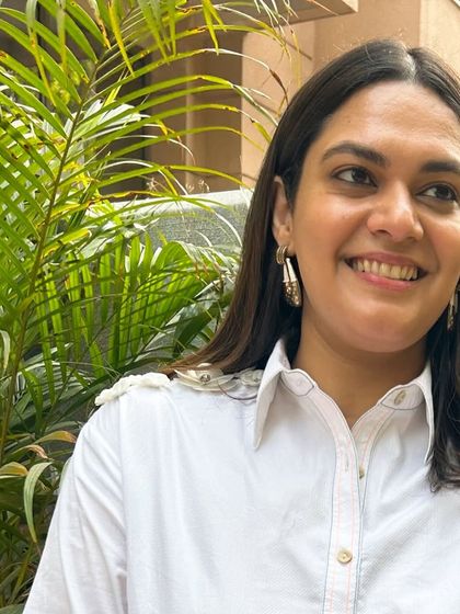 A close up on the floral shoulder detail of the Stitch Stories white shirt. I always focus on these unique design elements that make a piece special.