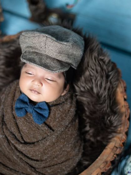 A close-up of our little gentleman, looking very stylish even in his sleep.