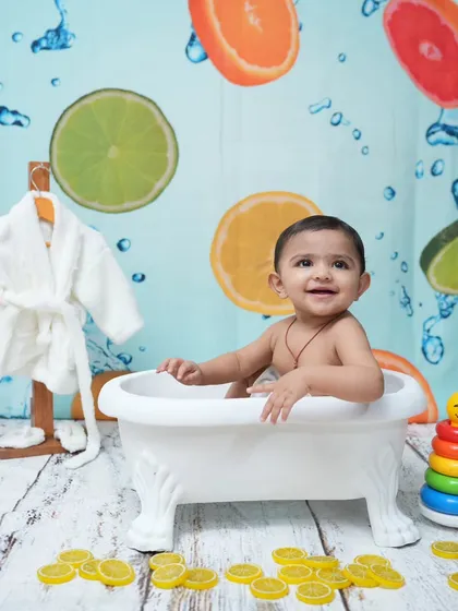 Splish, splash, having a blast! The bathtub setup is a simple and fun way to capture pure, happy smiles from your little one.