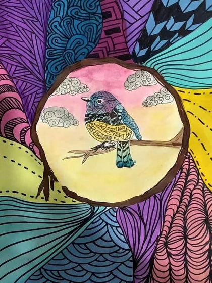 We just love tangling with Zentangles! This beautiful piece by a 12-year-old student combines watercolor with intricate black ink patterns, creating a mesmerizing effect.