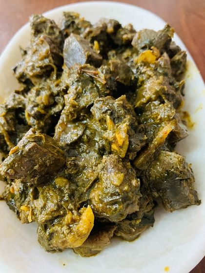 A close-up of the beef liver pickle, showing the texture of the liver and the thick, flavourful gravy it's cooked in.