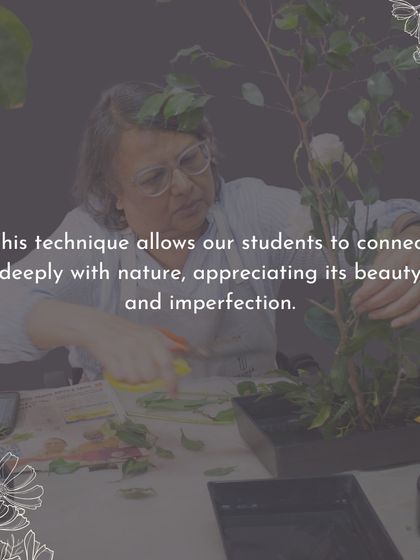 A student trims branches for her Ikebana piece. This technique allows for a deep connection with nature, appreciating its beauty and imperfection.