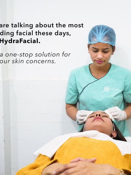 A therapist performing a HydraFacial on a client. We consider this our one-stop solution for many common skin concerns, delivering instant, visible results.