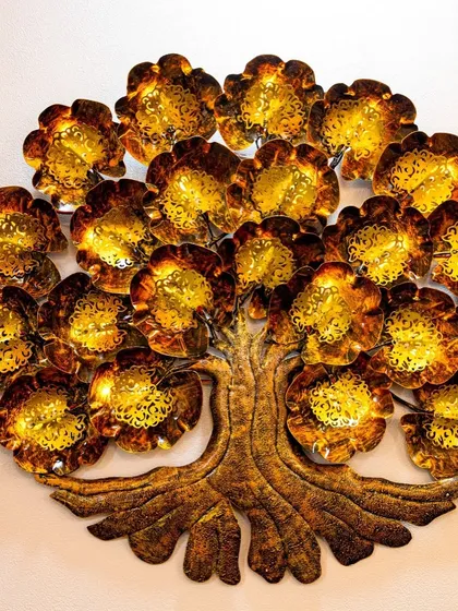 A beautiful metal wall art piece of the Tree of Life with integrated lights, adding a symbolic and decorative element to the living space.