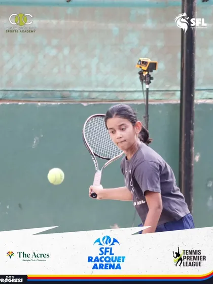 Eyes on the ball. A young athlete connects with a forehand during a training session, showing the results of our dedicated coaching and her hard work.