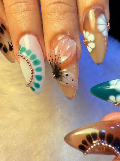 Another angle of our highly detailed, nature-inspired nail set. This view highlights the translucent 3D butterfly wing and the intricate patterns on each individual nail.