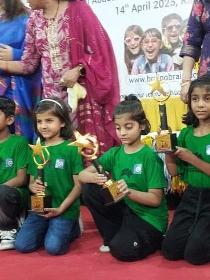 Our youngest achievers with their well-deserved trophies. We ensure that even the smallest competitors feel like champions, building their confidence from the very first competition.