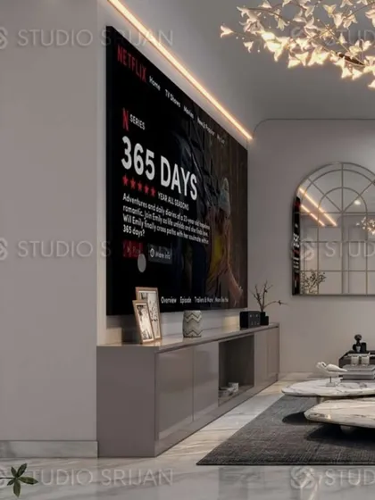 A home cinema setup within the lobby, featuring a large projector screen that retracts to maintain the room's aesthetic when not in use.