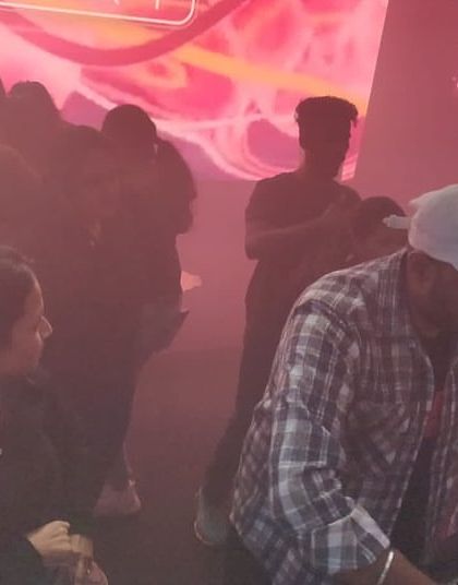 Another shot from the KEMA corporate event, capturing the smoky, high-energy vibe on the dance floor.