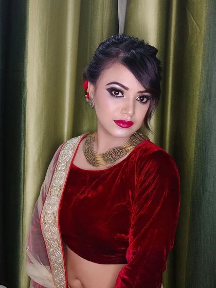 A full-face shot showing the balanced and beautiful makeup.