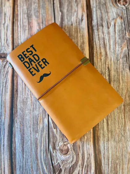 A "Best Dad Ever" leather-bound journal, another thoughtful item from our Father's Day collection.