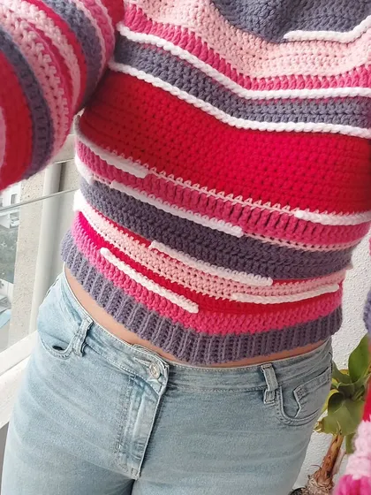 This is my Candy Crush Pullover, featuring unique textured stripes and a comfortable, relaxed fit.