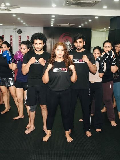 Team StrikeHive, ready for action. Our members wear our brand with pride, representing the strength and unity of our academy.