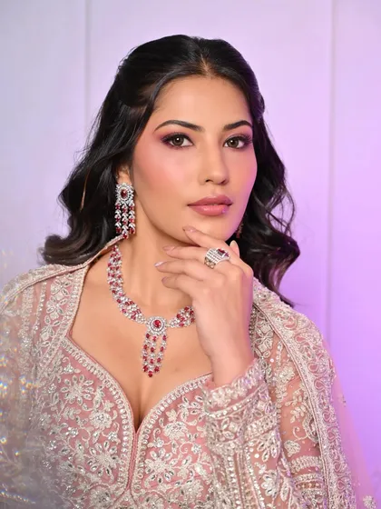 A close-up showcasing the beautiful pink-toned eye makeup and flawless complexion achieved by our student.