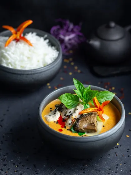 An archival shot of a Thai curry with rice from 2018, demonstrating my long-standing experience with Asian cuisine.
