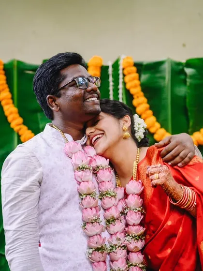 The moment it becomes real. Nikita and Dnyanratna, full of smiles and relief after the varmala exchange. The joy and love in this hug is palpable.