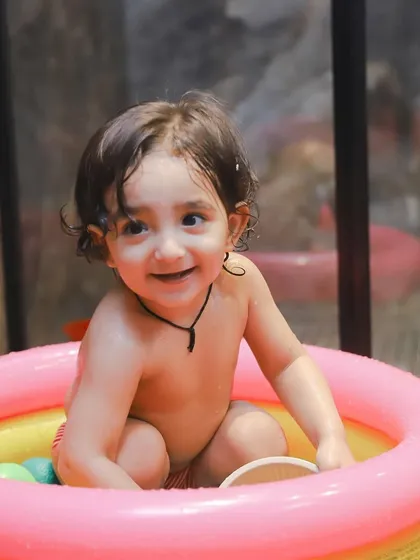 Pure happiness in a tub. Our playful water sessions are a wonderful way to capture your baby's giggles and splashes in a fun, relaxed setting.
