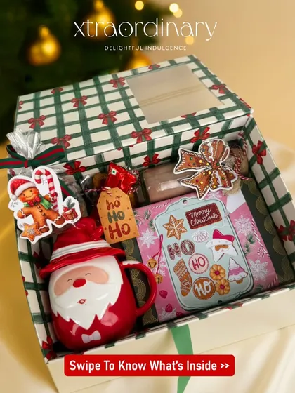 I love creating experiences, and our DIY Hot Chocolate Hamper is all about that. It includes everything you need for a cozy Christmas evening: a cute Santa mug, marshmallows, our special hot chocolate premix, and of course, freshly baked cookies.