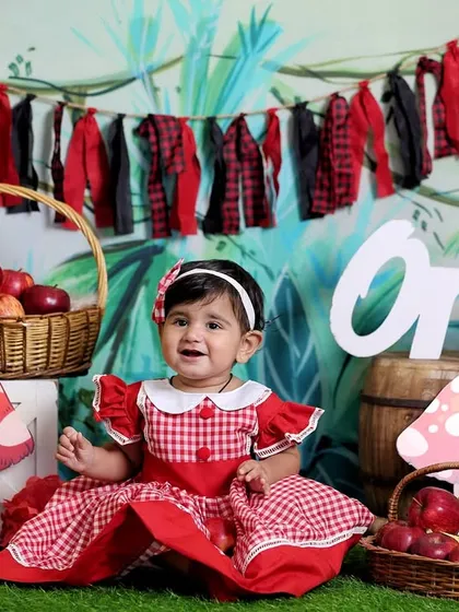 A candid moment from the Little Red Riding Hood shoot. These expressive, in-between moments are often the most charming.