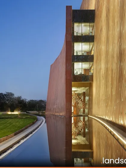 The Zydus Headquarters in Ahmedabad features a striking, sculptural form that is deeply connected to its environment. The surrounding water body is a key element of our passive cooling strategy, reflecting the building while helping to create a cooler microclimate through evaporative cooling.