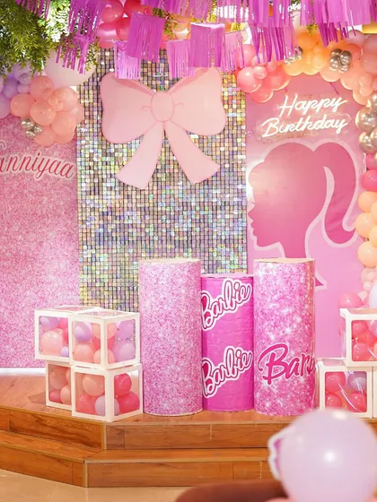 A glimpse into a spectacular Barbie-themed birthday party. We specialize in bringing grand visions to life with meticulous, Pinterest-worthy decor, from shimmering backdrops to perfectly coordinated balloon arrangements, creating a truly immersive experience.