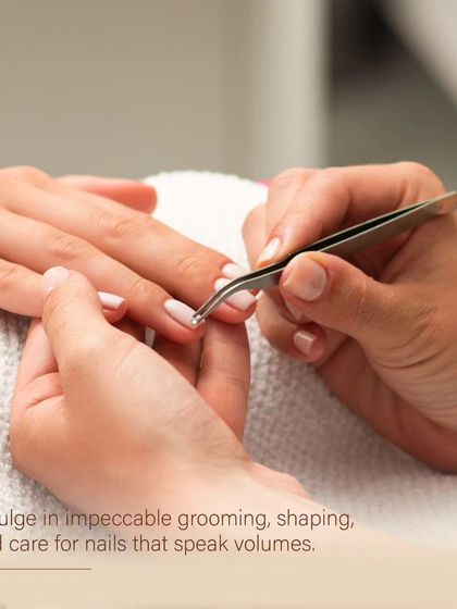 It's all in the details. For our custom nail art services, we use precision tweezers to place individual embellishments, turning your nails into a unique accessory.