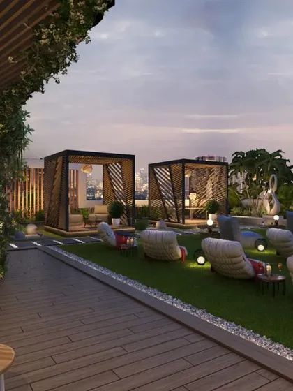 An open-air cinema on a residential terrace in Noida, complete with comfortable seating, private cabanas, and an outdoor bar. We design lifestyle amenities that transform common areas into exclusive entertainment zones for beautiful evenings under the stars.