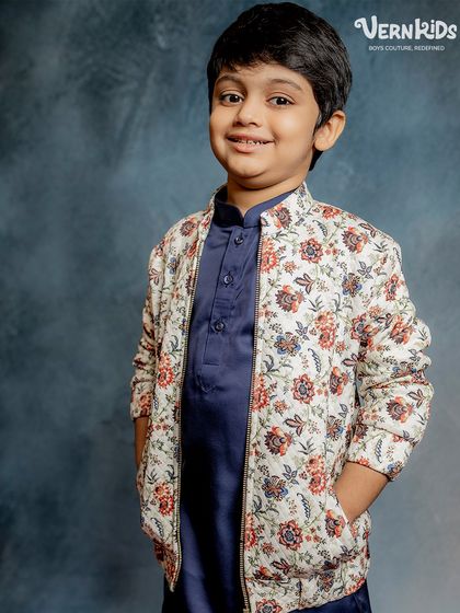 This floral bomber is a showstopper. It’s versatile enough for a wedding or a birthday party, making it a true all-rounder in his closet.