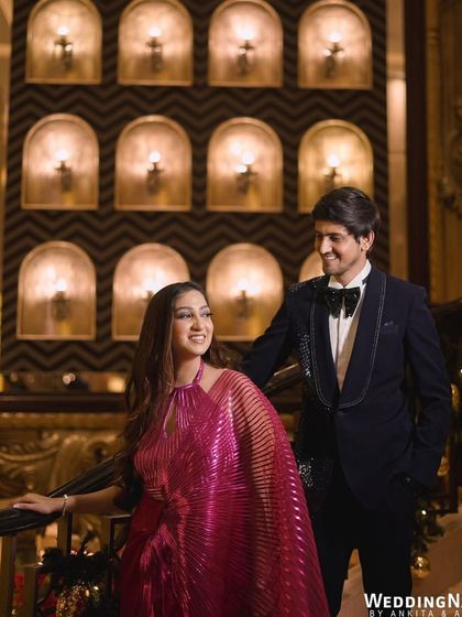 My bride Simran's pre-reception event. She wore a stunning metallic pink saree, and we kept the makeup glowing and glamorous.