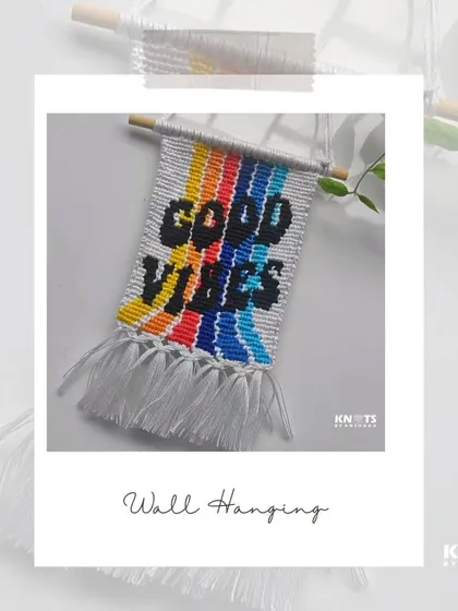 A "Good Vibes" wall hanging made with an alpha pattern, bringing a splash of color and positivity to any room.