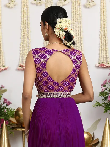 The back of the purple gown features a keyhole design, mirroring the modern details of our other Bandhani dresses.