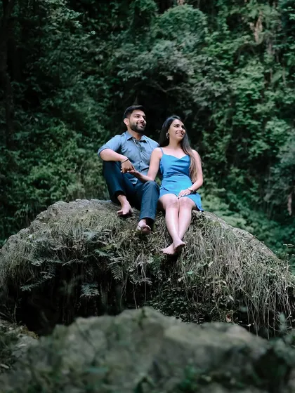 A quiet moment together on a mossy rock, surrounded by the lush greenery of a Shimla forest. These are the peaceful, natural shots that I love to capture.