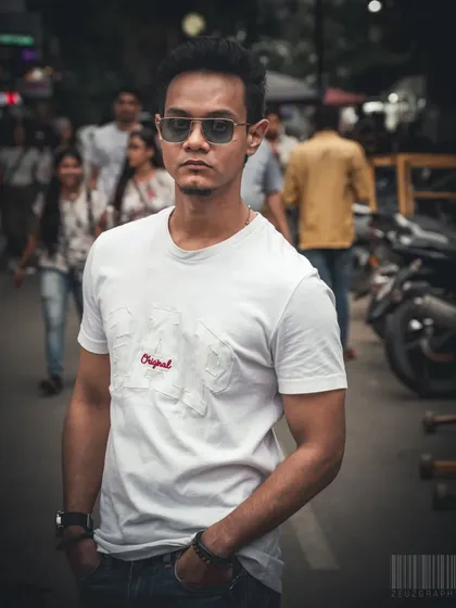 I love the challenge of an impromptu street portrait. This shot was taken on a busy Bangalore street, using natural light to create a moody, focused look that makes the subject stand out from the crowd. It’s about finding stories in plain sight.