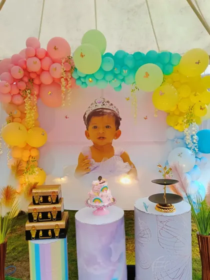 Another view of the pastel rainbow decoration for the outdoor party.