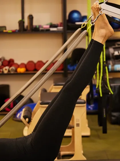 Core strong, mind strong. This leg series using the reformer straps helps to build long, lean leg muscles.