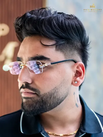 It is more than a haircut, it is a statement. We specialize in premium men's grooming, delivering sharp, textured fades and perfectly sculpted styles that are crafted with precision.