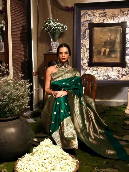 This full-set view shows how we integrate decor elements like flowers and pottery to build a rich, atmospheric scene for fashion photography. Every detail is curated to enhance the final image.
