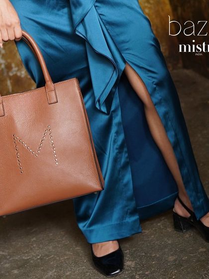 Our Studded M tote in a natural tan finish. This is an everyday Mistry piece, designed with a subtle studded initial to last you for years to come.