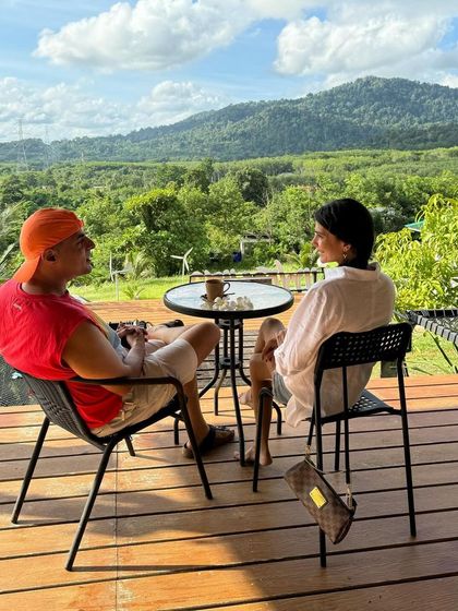 Quiet moments with my husband in Phuket, enjoying the stunning mountain scenery. These shared experiences are what I treasure most.