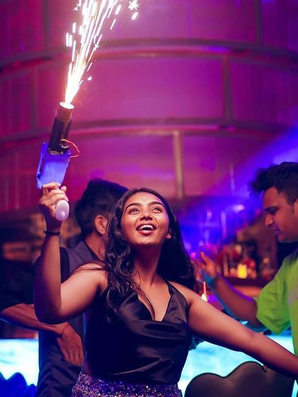 It's all about creating those picture perfect, high energy moments. Using props like cold pyro guns adds that extra spark to the night, making it a memorable one for everyone.