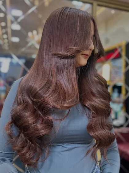 Another angle of the festive Mocha Mousse transformation. This color is one of our most popular for its rich tone and incredible shine.